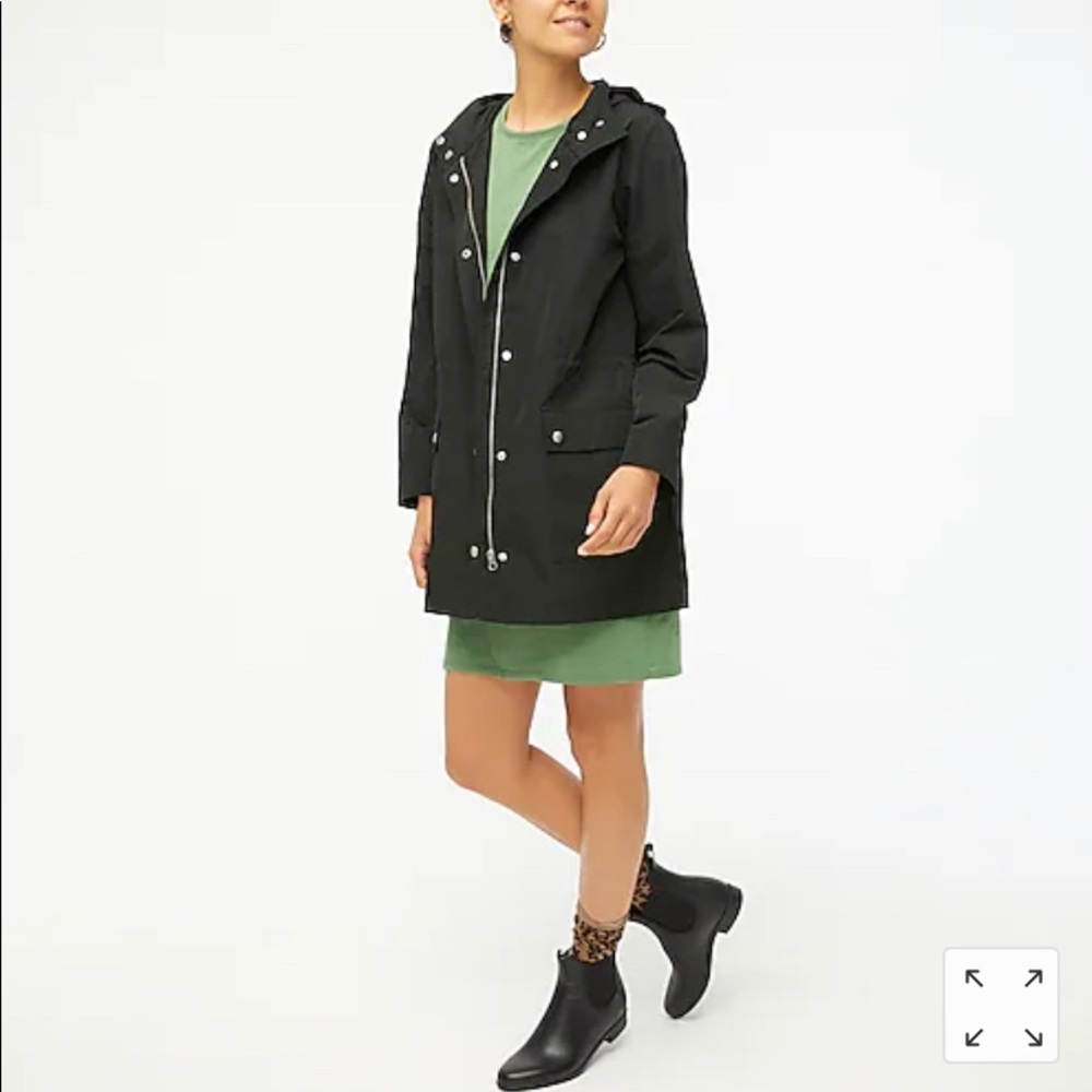 Midi-length raincoat with snaps